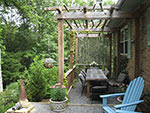 wood arbor over dining table